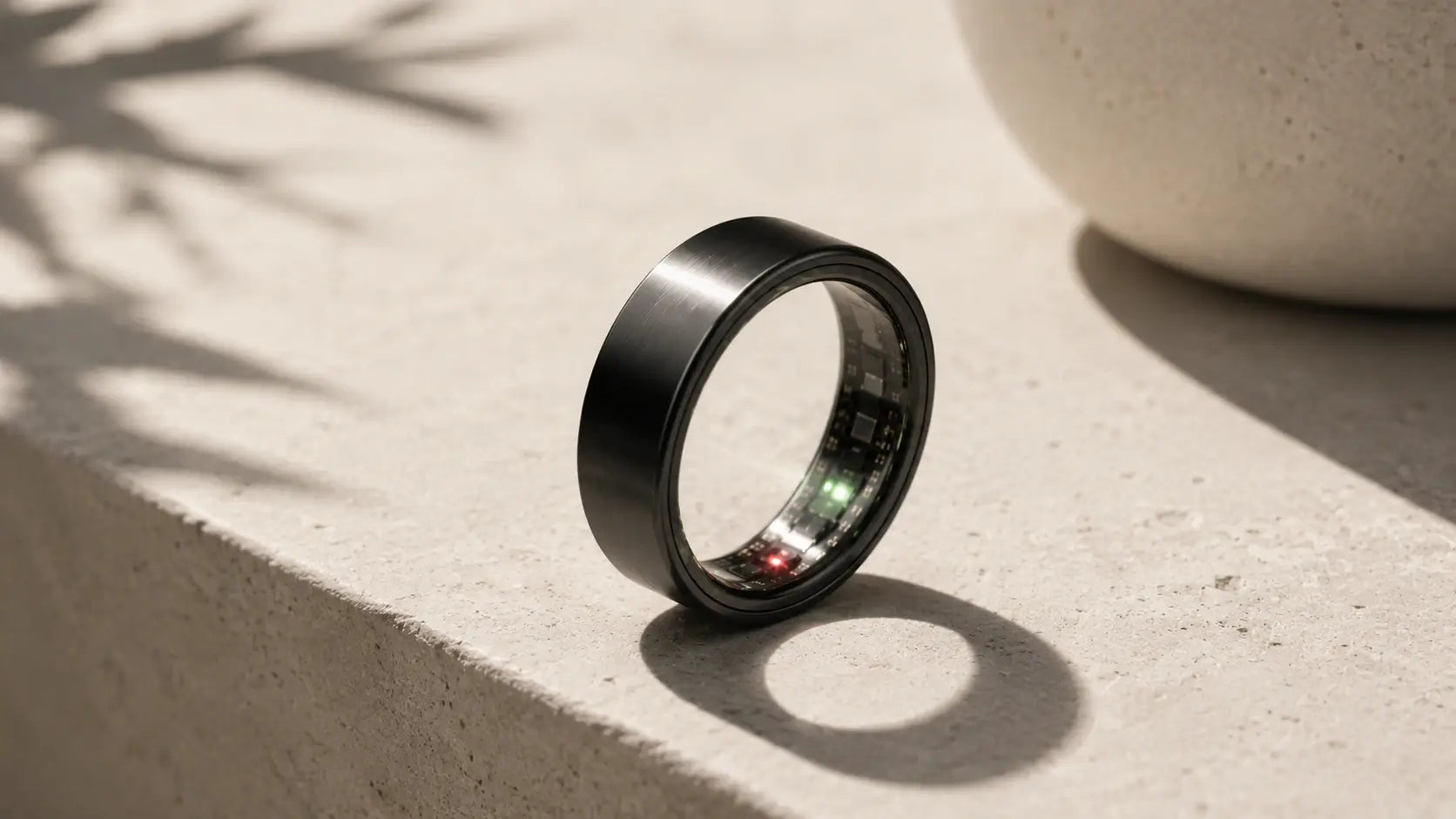 Smart ring with built-in sensors designed for 24/7 heart rate, blood oxygen, stress and wellness tracking